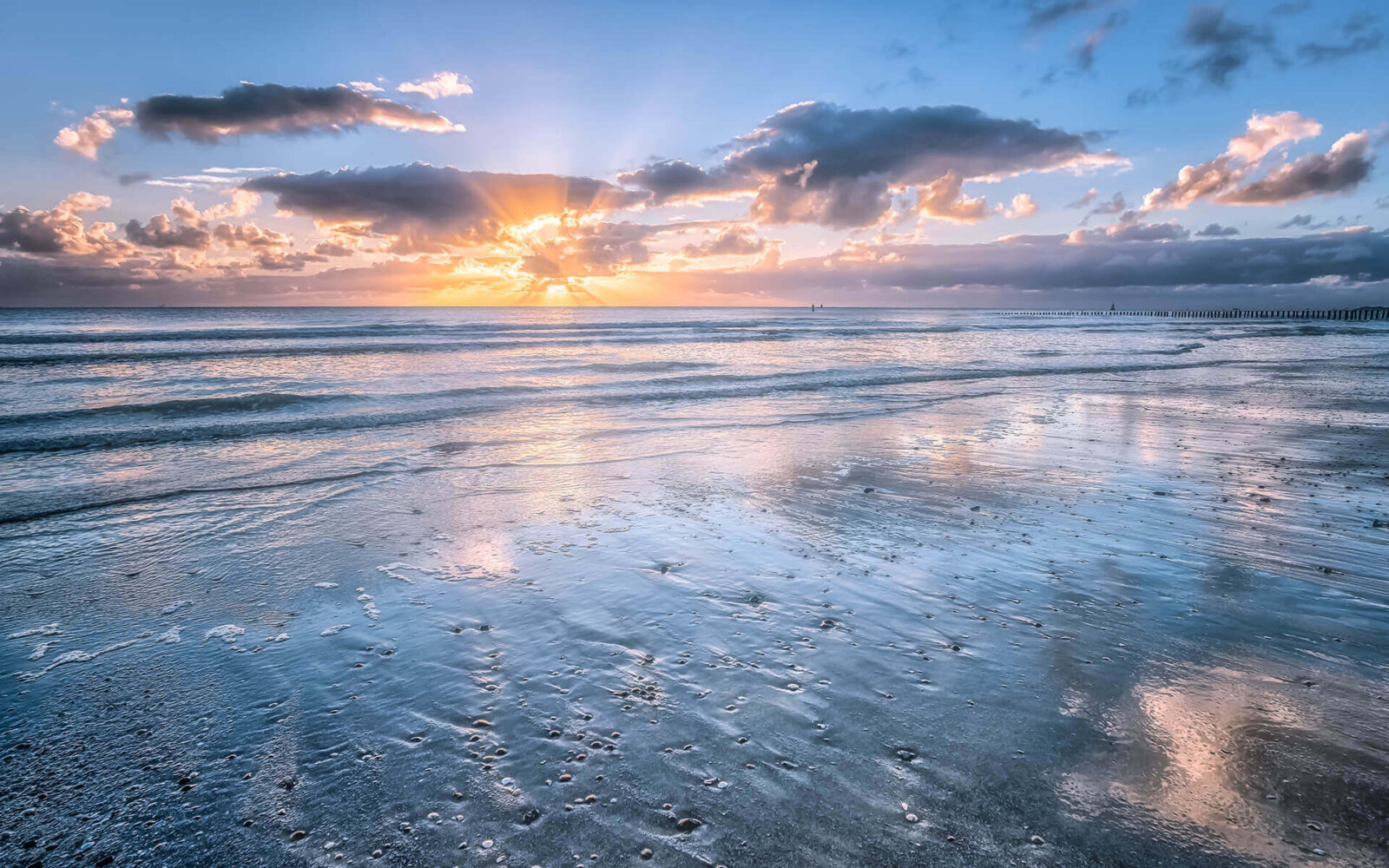 A royal sunset on the beach at Dishoek.