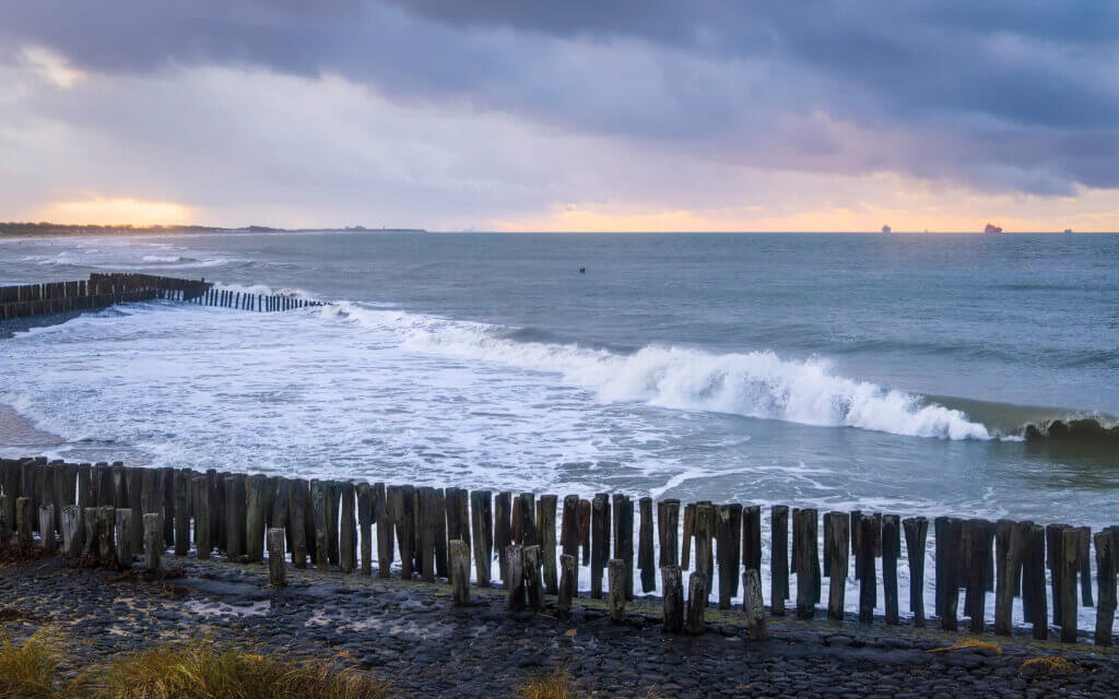 Nieuwesluis Around sunset, the sea calms down on the coast at Nieuwesluis, near Breskens in Zeeuws-Vlaanderen.