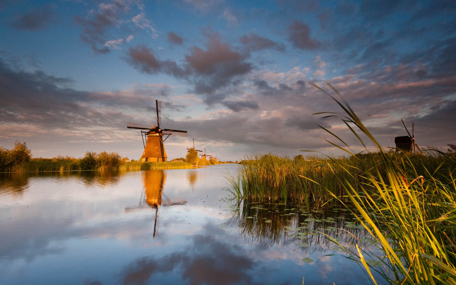 Kinderdijk A beautiful sunset at the UNESCO World Heritage windmills at Kinderdijk.