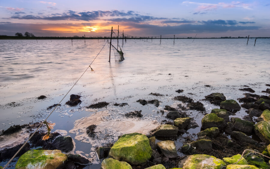 Fishing nets at sunset at the Veerse Meer.