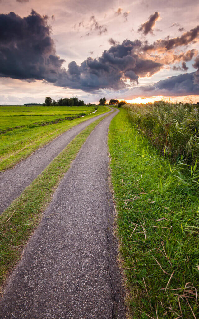 A beautiful hiker's path at sunset on the De Donk.
