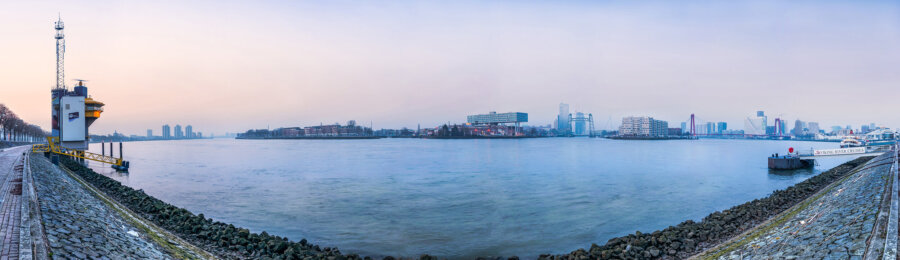 A panorama of the Rotterdam skyline in the first morning light.