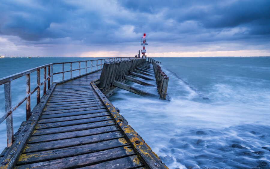 One early morning, before sunrise, at the harbour buoy of the Outer Harbour in Vlissingen. A beautiful view of the Western Scheldt during a force 7 gale.